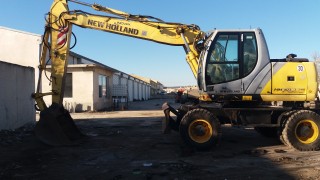 Багер на Тркала New Holland MH Plus