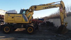 Багер на Тркала New Holland MH Plus